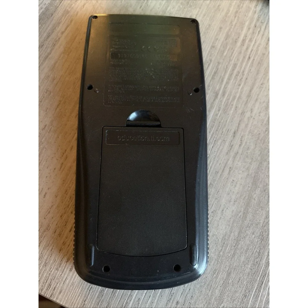 Texas Instruments TI-83 Plus Graphing Calculator with cover-works!
